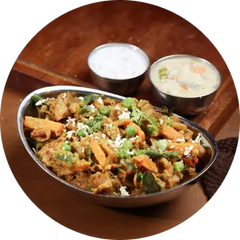 Spicy Parotta	(Served	With Kurma & Raitha)